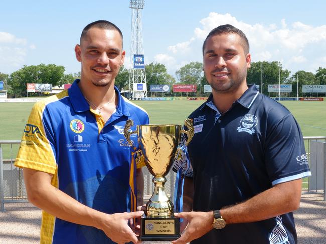 Wanderers captain Braedon McLean and Buffaloes captain Jarrod Stokes holding the Nungalinya Cup. Picture AFLNT Media