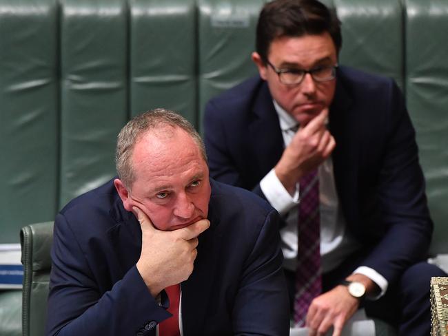 CANBERRA, AUSTRALIA - JUNE 22: Deputy Prime Minister Barnaby Joyce and Minister for Agriculture David Littleproud react during Question Time in the House of Representatives at Parliament House on June 22, 2021 in Canberra, Australia. Barnaby Joyce has been sworn in as Deputy Prime Minister by Governor-General Hurley today after Joyce deposed former Nationals leader Michael McCormack during a spill called yesterday by Senator Matt Canavan. Joyce is re-elected as leader of The Nationals in a leadership contest with at least 12 votes in the 21-member partyroom.  (Photo by Sam Mooy/Getty Images)