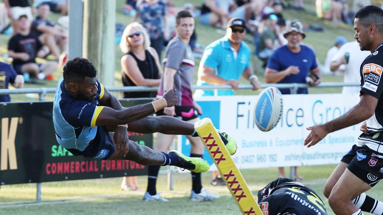 A remarkable photo when Jonathon Reuben played at Norths Devils. Picture: Liam Kidston