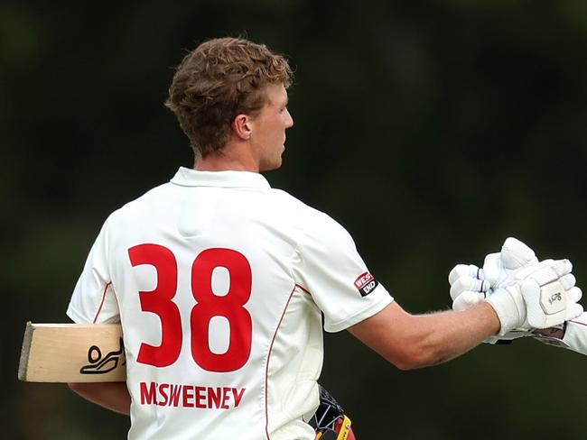 SYDNEY, AUSTRALIA - OCTOBER 11: Nathan McSweeney of the Redbacks celebrates scoring his century with team mate Daniel Drew of the Redbacks during the Sheffield Shield match between New South Wales and South Australia at Cricket Central, on October 11, 2024, in Sydney, Australia. (Photo by Brendon Thorne/Getty Images)