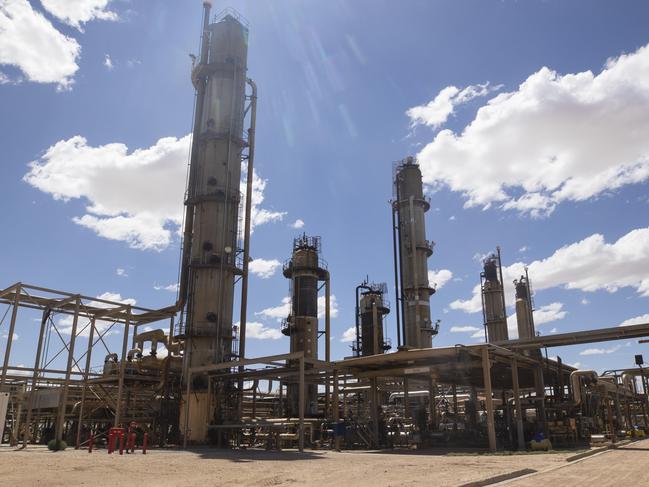 Building a Bigger Better SA - Manny Fortuna with his daughter Laura at the Santos Moomba Gas Plant 8 February, 2022. Picture Simon Cross