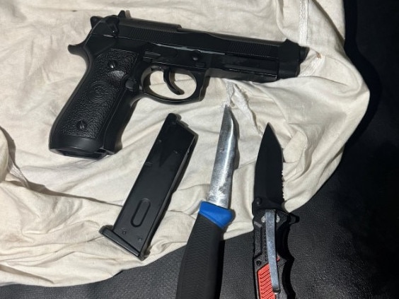 A search of the vehicle uncovered two knives — one being a prohibited flick knife — and a gel blaster pistol. Picture: The Hills Police Area Command