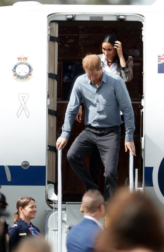 Harry and Meghan arriving at the township of Dubbo.