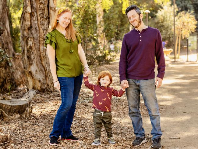 Laura Johansen with her husband Brett and son Atlas. Picture: Amelie Garrett