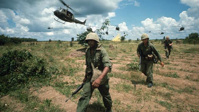 Tim Page’s photo of US troops during the Iron Triangle assault in Vietnam. Picture: Getty Images