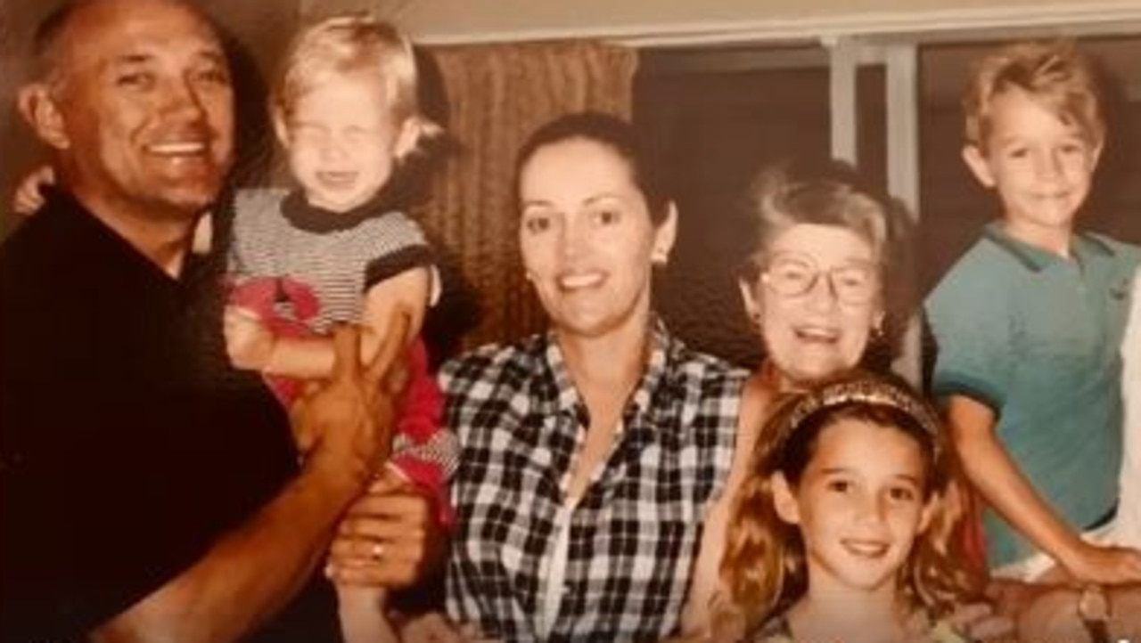 A young Jasmine, bottom right, with father Bob, sister Jade, mother Cheryl, a family friend, and brother Josh.