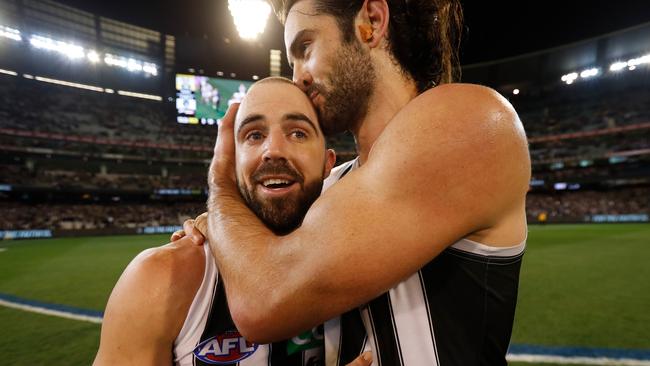 Steele Sidebottom and Brodie Grundy after the game. Picture: Getty Images