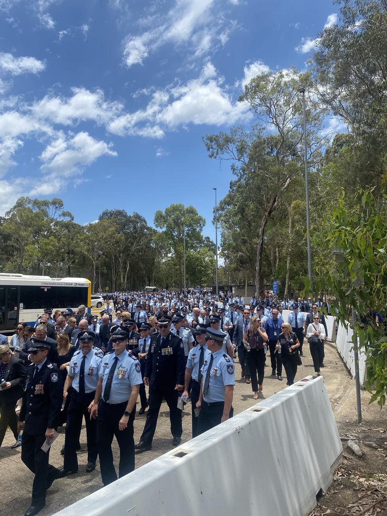 A sea of blue outside the Brisbane Entertainment Centre following the service for two Queensland police officers killed in an ambush. Picture: Samantha Scott