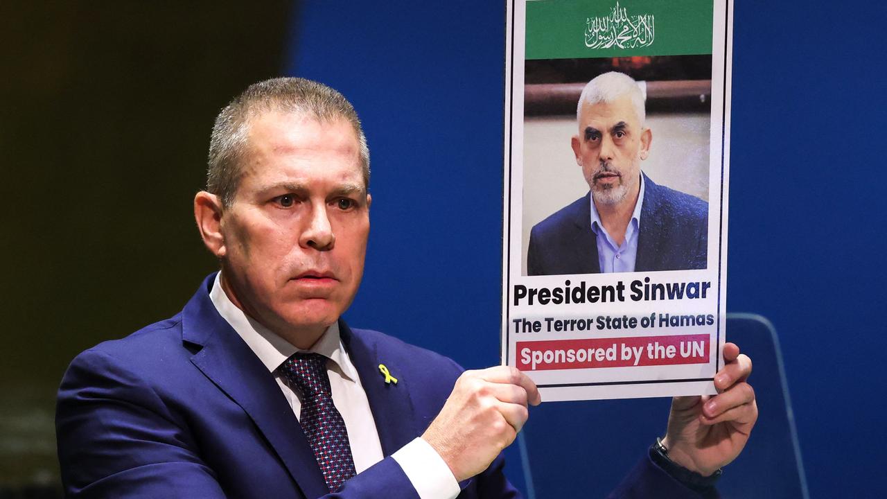 Israeli Ambassador to the United Nations Gilad Erdan holds up a picture of Hamas leader Yahya Sinwar during a special session of the UN General Assembly regarding the Palestinian bid for full membership to the UN, at UN headquarters in New York City on May 10, 2024. A veto from the United States during an April 18, 2024 UN Security Council meeting previously foiled the Palestinians' drive for full UN membership. (Photo by Charly TRIBALLEAU / AFP)