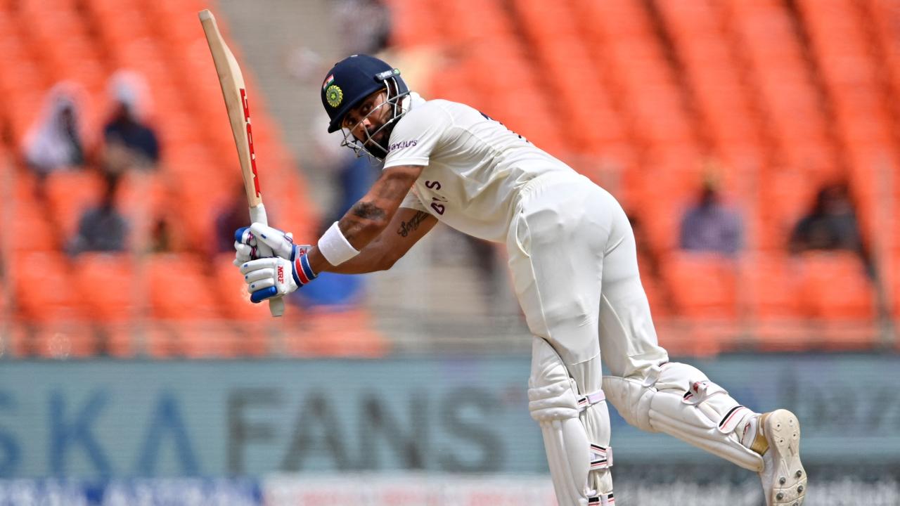 India's Virat Kohli watches the ball after playing a shot during his century. Picture: AFP