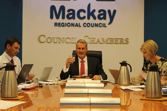 Mayor Greg Williamson raises a glass following Mackay Regional Council's decision to remove fluoride from the region's water. Picture: Luke Mortimer