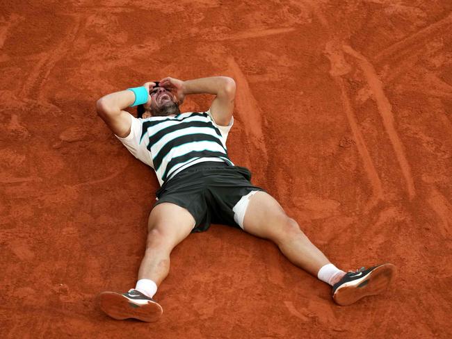 Spain's Carlos Alcaraz celebrates after winning the French Open. Picture: AFP