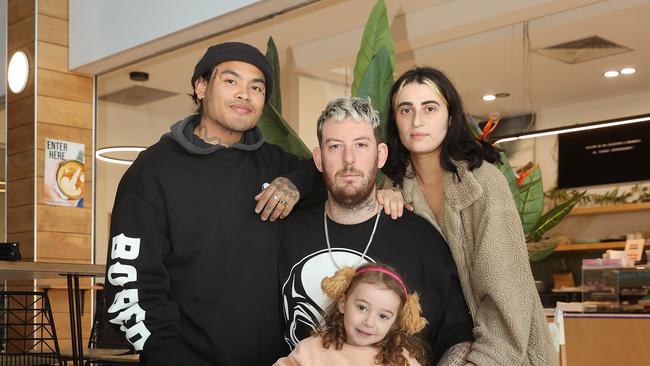 Jordan Frank, left, is hosting a music launch fundraiser to help ‘G’ Houston, his partner Kara Monterosso and their daughter Winnter, 4, after a motorbike accident. Picture: Alison Wynd