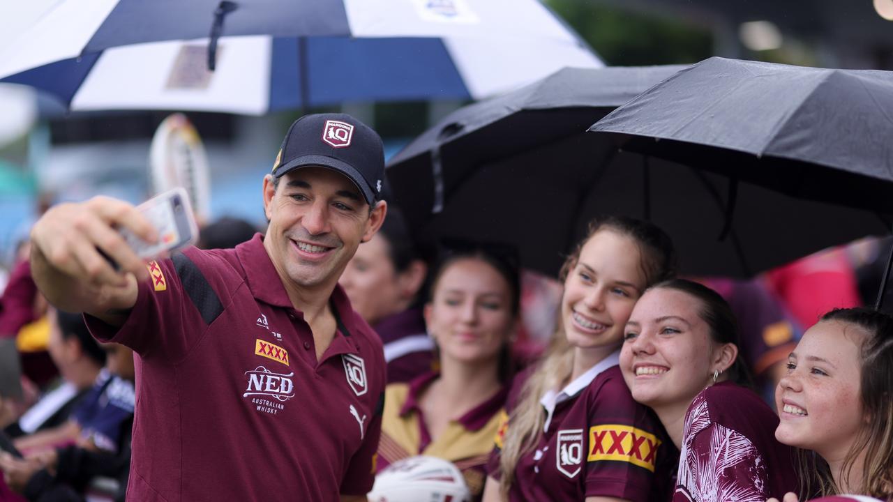 Queensland coach Billy Slater takes a selfie with Maroons supporters during a fan day. Picture: Erick Lucero QRL