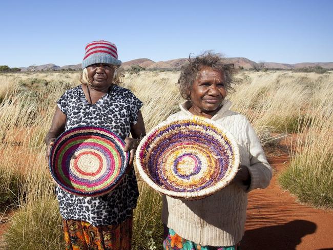 Women with their Tjanpi Desert Weavers creations.