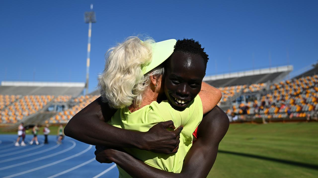 Gout Gout celebrates with his coach Di Sheppard after winning the Men 200m Under 20 Finals. (Photo by Albert Perez/Getty Images)