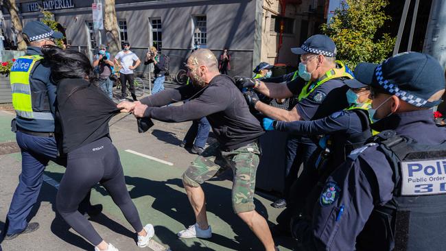 Anti-lockdown protesters in Melbourne clash with police in 2021. Picture: Jason Edwards