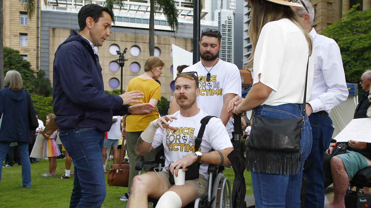 Queensland opposition leader David Crisafulli (left) talks to crime victim Karl Boevink on Sunday. Picture: NCA NewsWire/Tertius Pickard