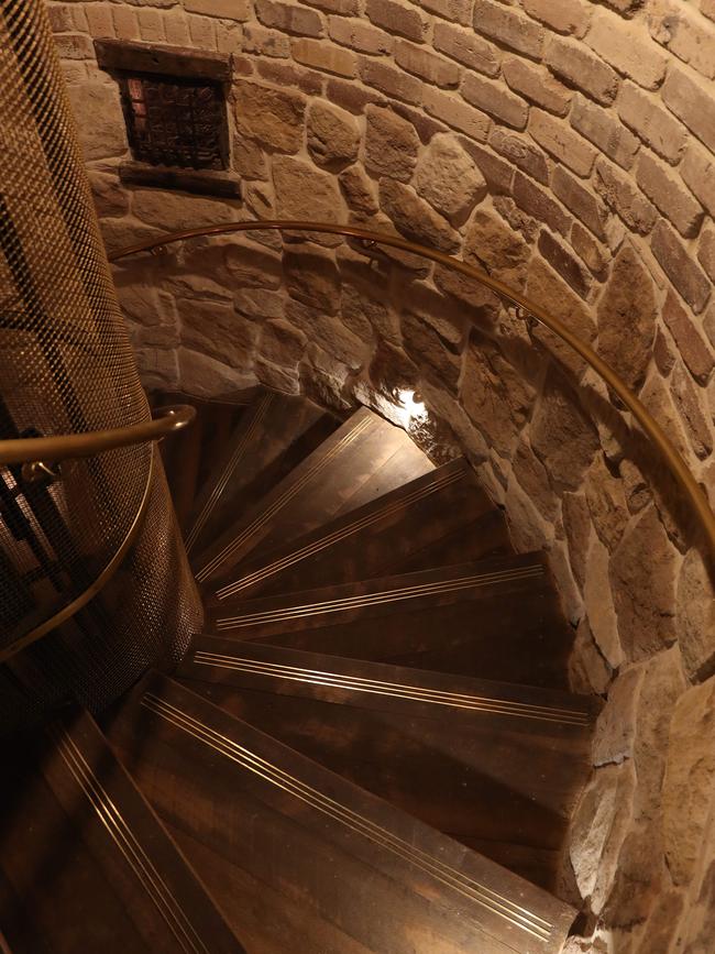 … and down a spiral staircase. Picture: Brett Costello