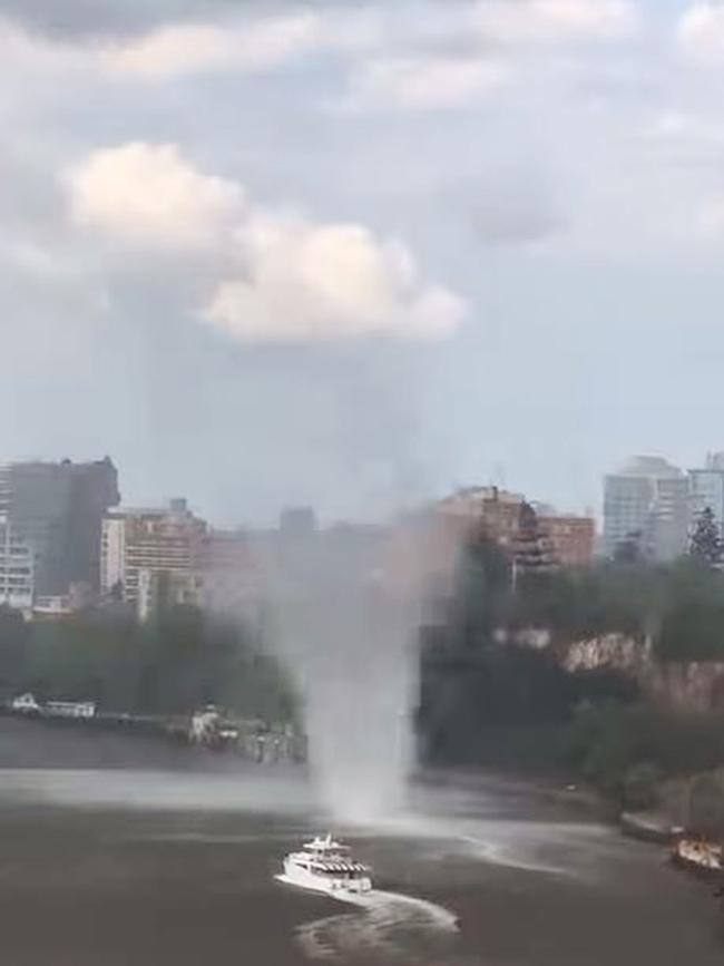 Screen shots of a mini tornado sweeping across the Brisbane River during an afternoons storm. Source: Nicole McIntosh.