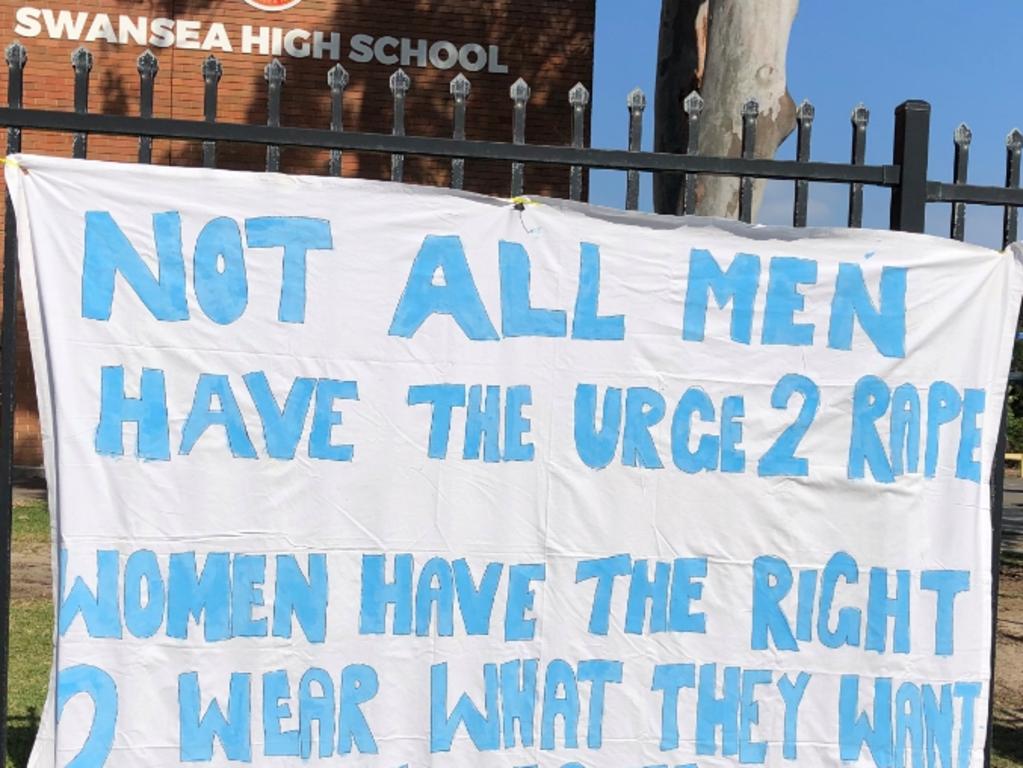 The students made signs and banners to protest outside the school.