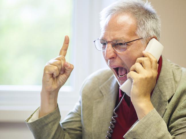 Angry senior businessman yelling at the phone, money, retiree