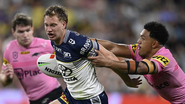 TOWNSVILLE, AUSTRALIA - MAY 10: Jaxon Purdue of the Cowboys males a break during the round 10 NRL match between North Queensland Cowboys and Penrith Panthers at Queensland Country Bank Stadium, on May 10, 2025, in Townsville, Australia. (Photo by Ian Hitchcock/Getty Images)