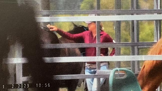 Peta Durston in footage recorded at a horse ranch by a private investigator. Ms Durston denied being employed at the ranch while receiving workers’ compensation, saying she was volunteering