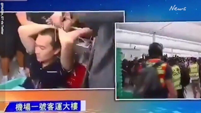 Reporter seized by demonstrators at Hong Kong airport