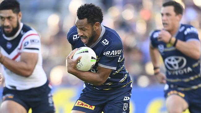 TOWNSVILLE, AUSTRALIA - JULY 17:  Hamiso Tabuai-Fidow of the Cowboys makes a break during the round 18 NRL match between the North Queensland Cowboys and the Sydney Roosters at QCB Stadium, on July 17, 2021, in Townsville, Australia. (Photo by Ian Hitchcock/Getty Images)