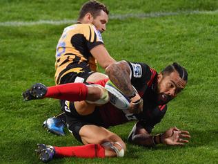 CHRISTCHURCH, NEW ZEALAND - MARCH 24: Digby Ioane of the Crusaders dives over to score a try during the round five Super Rugby match between the Crusaders and the Force at AMI Stadium on March 24, 2017 in Christchurch, New Zealand. (Photo by Kai Schwoerer/Getty Images)