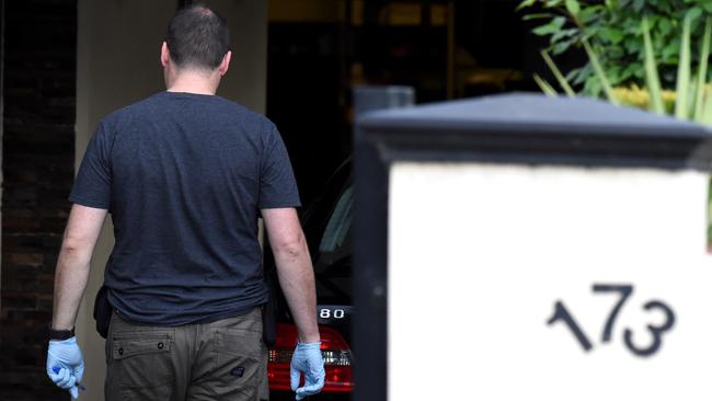 An officer during Thursday’s IBAC raid on F &amp; M printing. Picture: Nicole Garmston