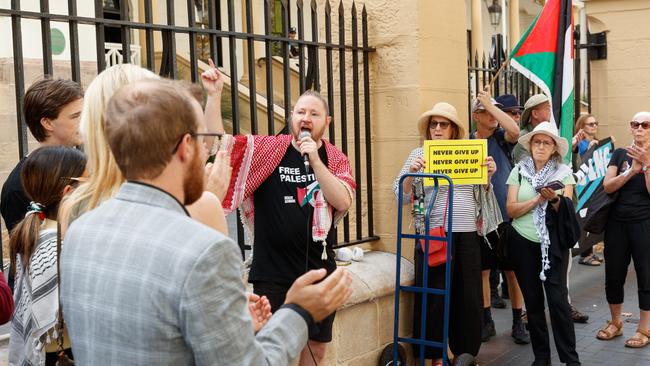 PAG spokesperson Josh Lees (centre) said the Palestine Action Group filed a constitutional challenge in the Supreme Court of NSW. Picture: NewsWire / Max Mason-Hubers