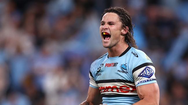 SYDNEY, AUSTRALIA - SEPTEMBER 20:  Nicho Hynes of the Sharks celebrates winning the NRL Semi Final match between Cronulla Sharks and North Queensland Cowboys at Allianz Stadium on September 20, 2024 in Sydney, Australia. (Photo by Jason McCawley/Getty Images)