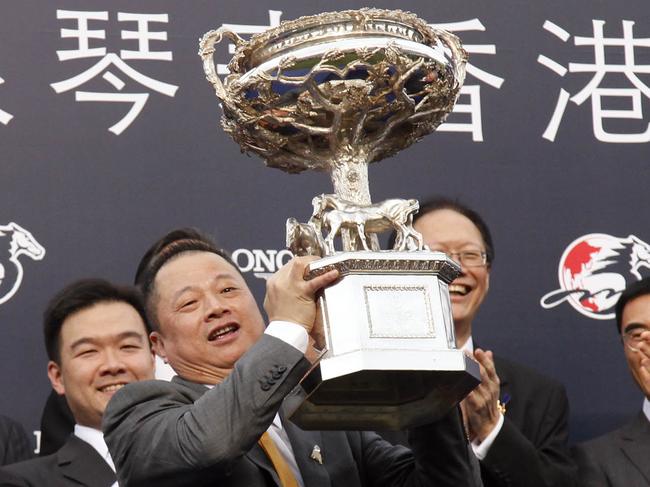 Owner Pan Sutong at the trophy presentation for Akeed Mofeed's Hong Kong Cup victory, Sha Tin, Dec 2013. Picture: Hong Kong Jockey Club.