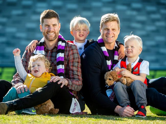 Alex Riewoldt with his son George, 2, and Nick Riewoldt with sons James, 4, and William, 2, ahead of Maddie's Match between St Kilda and Richmond in 2019. Picture: Jay Town