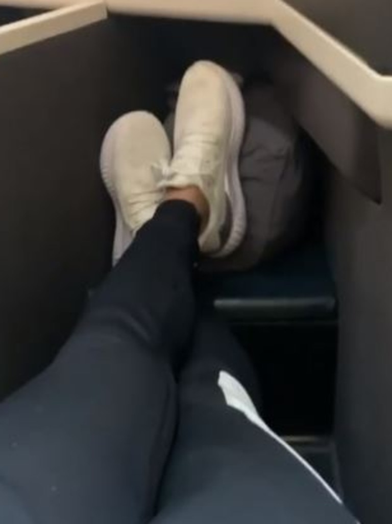 The moon boot was off within minutes of him going into business class