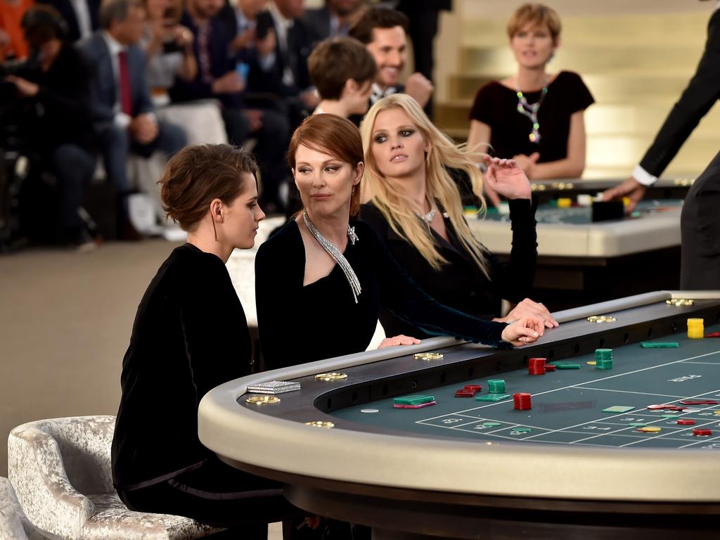 Kristen Stewart, Julianne Moore and Lara Stone attend the Chanel show as part of Paris Fashion Week Haute Couture Fall/Winter 2015/2016. Picture: Getty