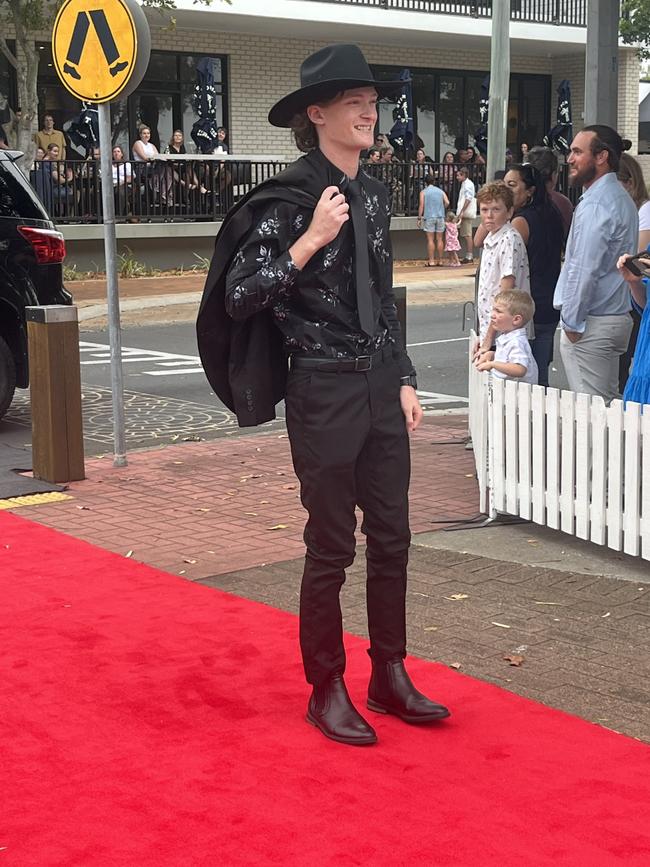 Liam Webster arrives at Urangan State High School's formal.