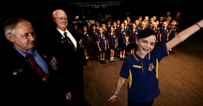 ALL TOGETHER NOW: Member Daisi Thompson, 11, leading the Lismore Public School senior choir in O Valiant Heart at Southern Cross University’s recording studio, listened to by Lismore RSL Sub Branch members. Picture: Marc Stapelberg