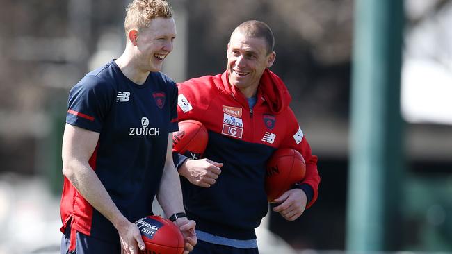 Clayton Oliver and Simon Goodwin have a laugh. Picture: Michael Klein