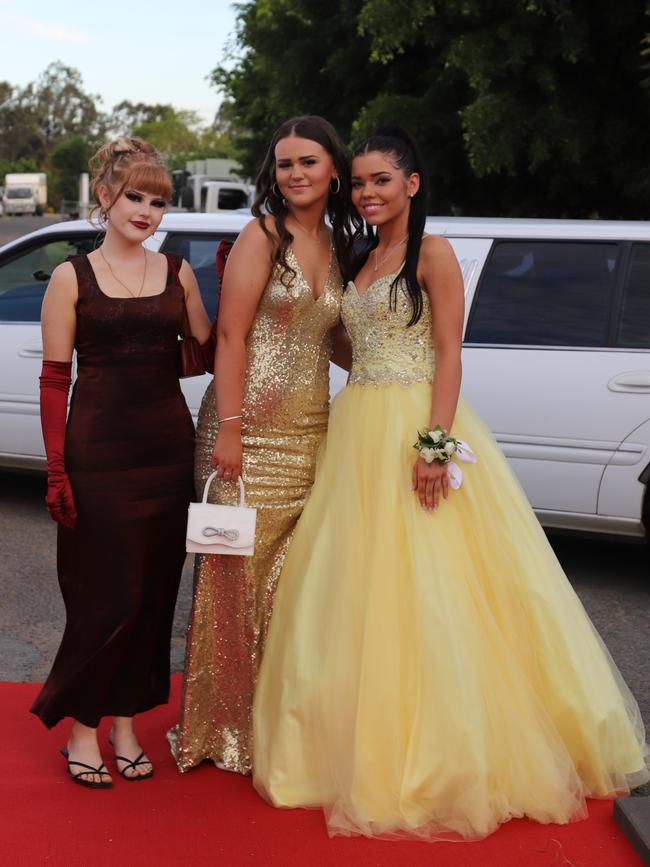 Isabella O'Toole, Brianna Reason, Abby-Rose Rogers at the James Nash State High School formal 2022.