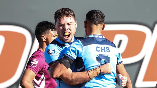 NSW's Ethan Ferguson celebrates after scoring during the under 18 ASSRL schoolboy rugby league championship grand final last year.