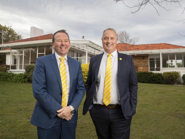 Ray White business partner Stuart Benson and Managing Director Nick Cowley at Alexandra Esplanade, Bellerive property that sold for $2.4 million. Picture: Chris Kidd