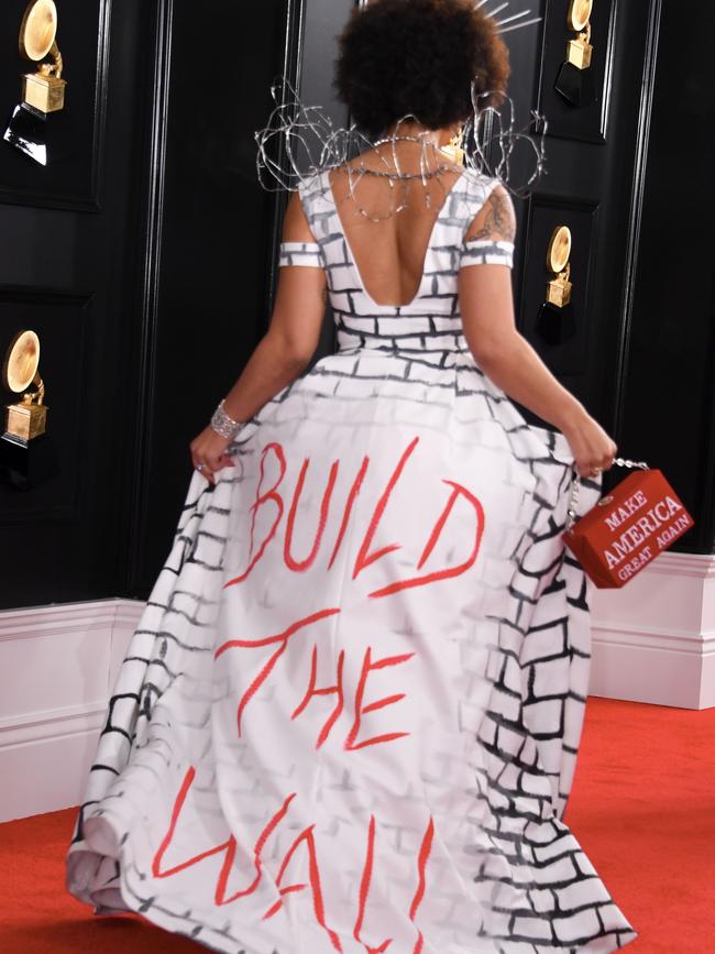 Singer Joy Villa shows off the back of her dress making a political statement. Picture: AFP