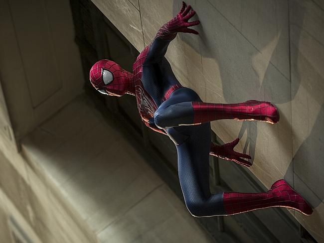 Climing walls ... Andrew Garfield stars as Spider-Man in The Amazing Spider-Man 2, also starring Emma Stone.