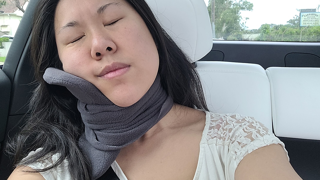 Leaning into the trtl travel pillow. Picture: Stephanie Yip/Escape