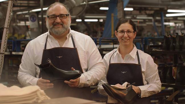 R. M. Williams staff Costa and Vanessa at the Salisbury factory. Picture: Supplied