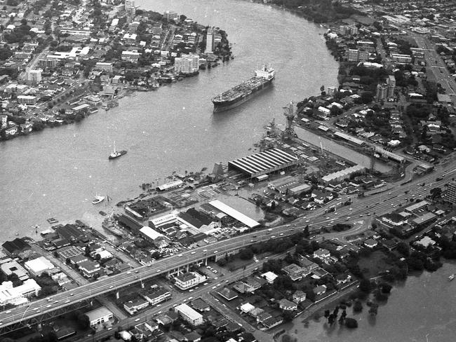 The Brisbane River in flood with the ship Robert Miller anchored in mid-stream.