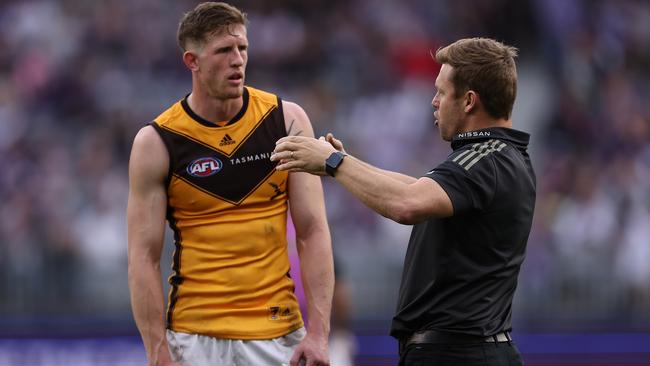 Defender Sam Frost, speaking with coach Sam Mitchell, won’t play again this year. Picture: Getty Images